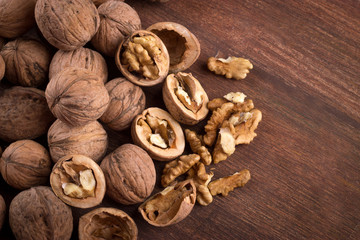 Walnuts whole in their skins, chopped, nut hulls, walnut kernels
