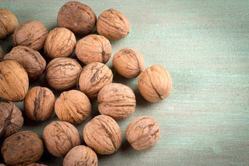 Walnuts whole in their skins, chopped, nut hulls, walnut kernels