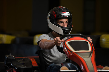 Young Man Driving Go-Kart Karting Race - obrazy, fototapety, plakaty