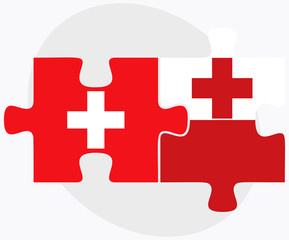 Obraz premium Switzerland and Tonga Flags