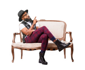 black man sitting on a sofa