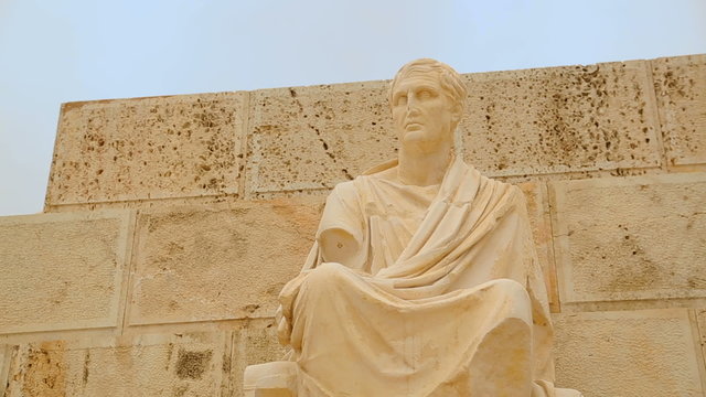 Ancient marble statue at Theater of Dionysus Eleuthereus in Athens, Greece