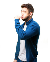 young man coughing