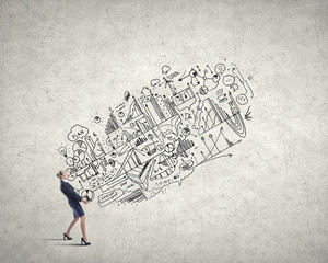 Obraz premium Businesswoman carrying out idea