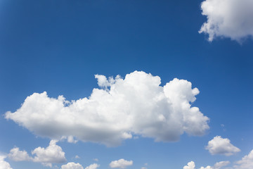 Naklejka na ściany i meble Beautiful light blue sky with puffy white clouds