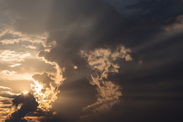 colorful sunset sky background with clouds and sun light