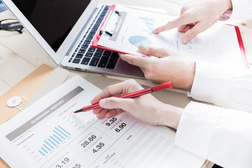 Business people discussing the charts and graphs showing the res