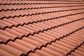 brown tile roof weathered on building residential