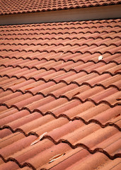 brown tile roof weathered on building residential