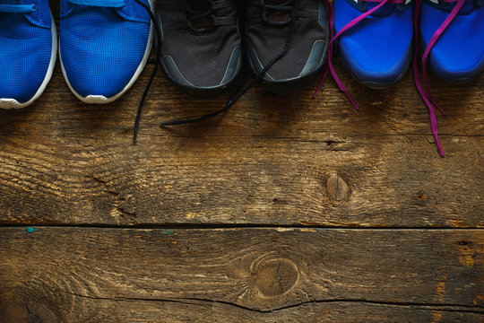 Close up of sneakers on wooden background