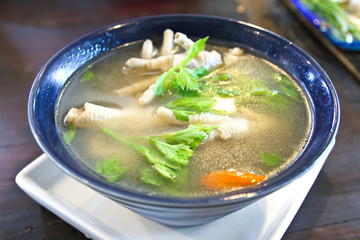 Chicken feet in a bowl with spicy soup,thai food