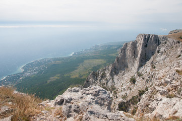 Fototapeta na wymiar View of crimean coastline from the plateau of Ai-Petri mountain
