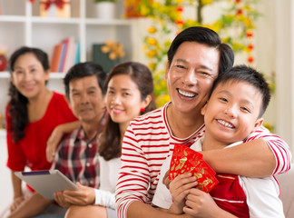 Happy family celebrating Tet