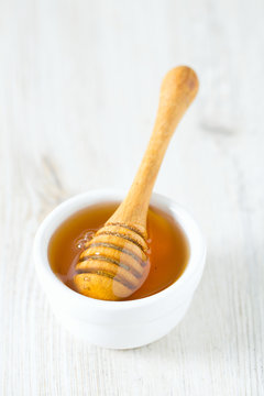 honey on wooden surface