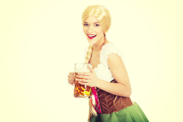 Beautiful bavarian woman with beer.