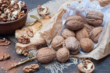 Walnuts in the shell in a paper bag