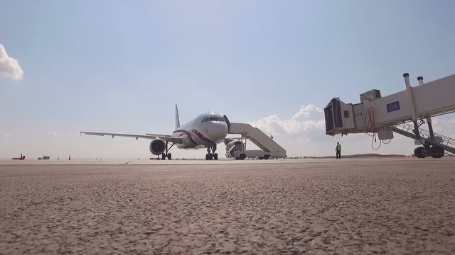 plane with a ladder standing at the airport