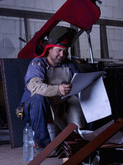 Fototapeta na wymiar Portrait of a welder at his workplace