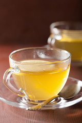 hot lemon ginger tea in glass cup