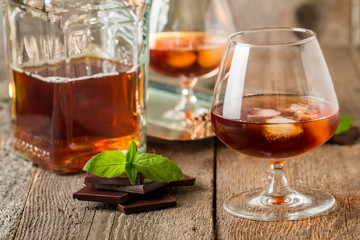 Vintage cognac still life with chocolate