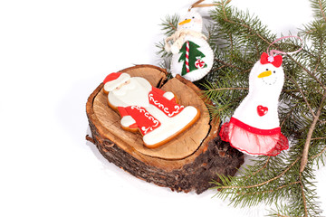 Christmas cookies with festive decoration on the white background.