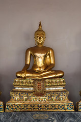 Golden Buddha sculpture in Wat Pho
