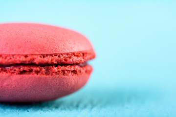 Red French Macaroon On Blue Background