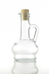 Glass Bottle / High resolution  image of glass bottle cruets used to store oils and vinegar with stopper shot in studio over white background.