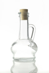 Glass Bottle / High resolution  image of glass bottle cruets used to store oils and vinegar with stopper shot in studio over white background.