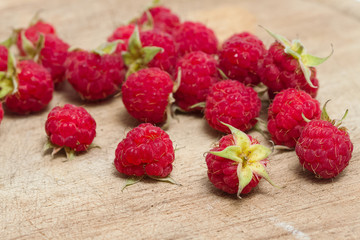 Raspberries  fruit on wooden background , selective focus