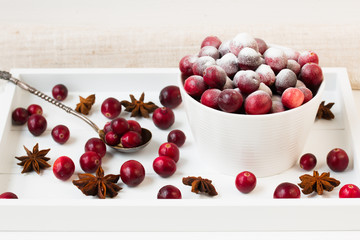 Fresh cranberries coated of sugar powder.
