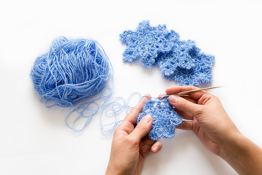 Knitting blue snowflake