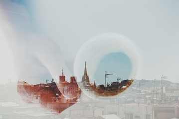 Double exposure with Barcelona and hand holding cup of coffee