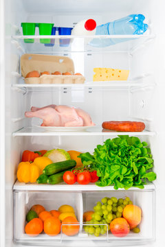 shelf of the refrigerator with food