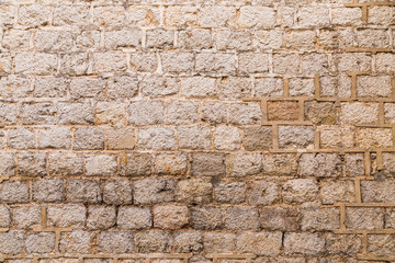 Old weathered brick wall background