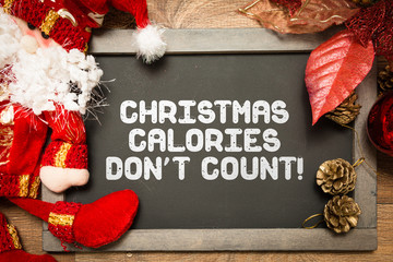 Blackboard with the text: Christmas Calories Don't Count