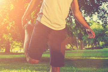 Stretching after jogging.