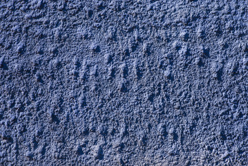 Fototapeta na wymiar Closeup of a lilac blue wall