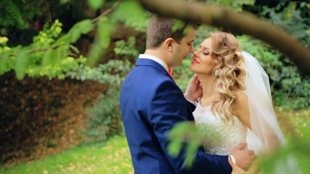 Loving caucasian couple looking into each others  wedding shot in slow motion  close up