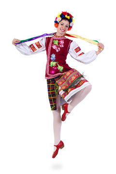 Beautiful Jumping Girl In Ukrainian Polish National Traditional Costume Clothes Happy Smile, Full Length Portrait Isolated