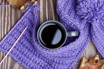 Warm cap, scarf and hot drink