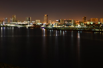 Fototapeta na wymiar The night skyline of Long Beach, Los Angeles taken from the Queen Mary.