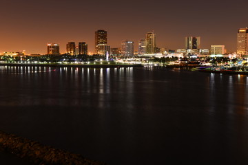 Fototapeta premium The night skyline of Long Beach, Los Angeles taken from the Queen Mary.