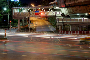 crossroad night speed light in bangkok