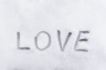 Love word writen on the snow, love concept