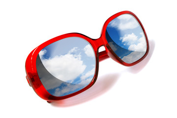 Red sunglasses isolated with sky view