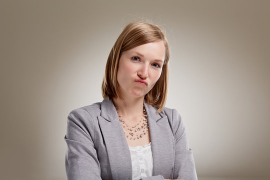 Blonde 20s woman, with pout