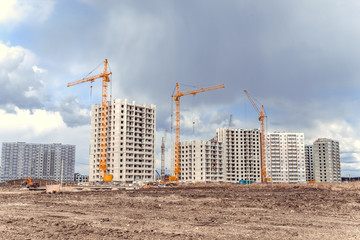 New flats and industrial cranes