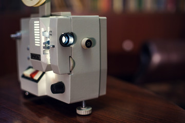 Movie projector with the film