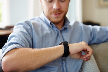 Close Up Of Man Wearing Smart Watch